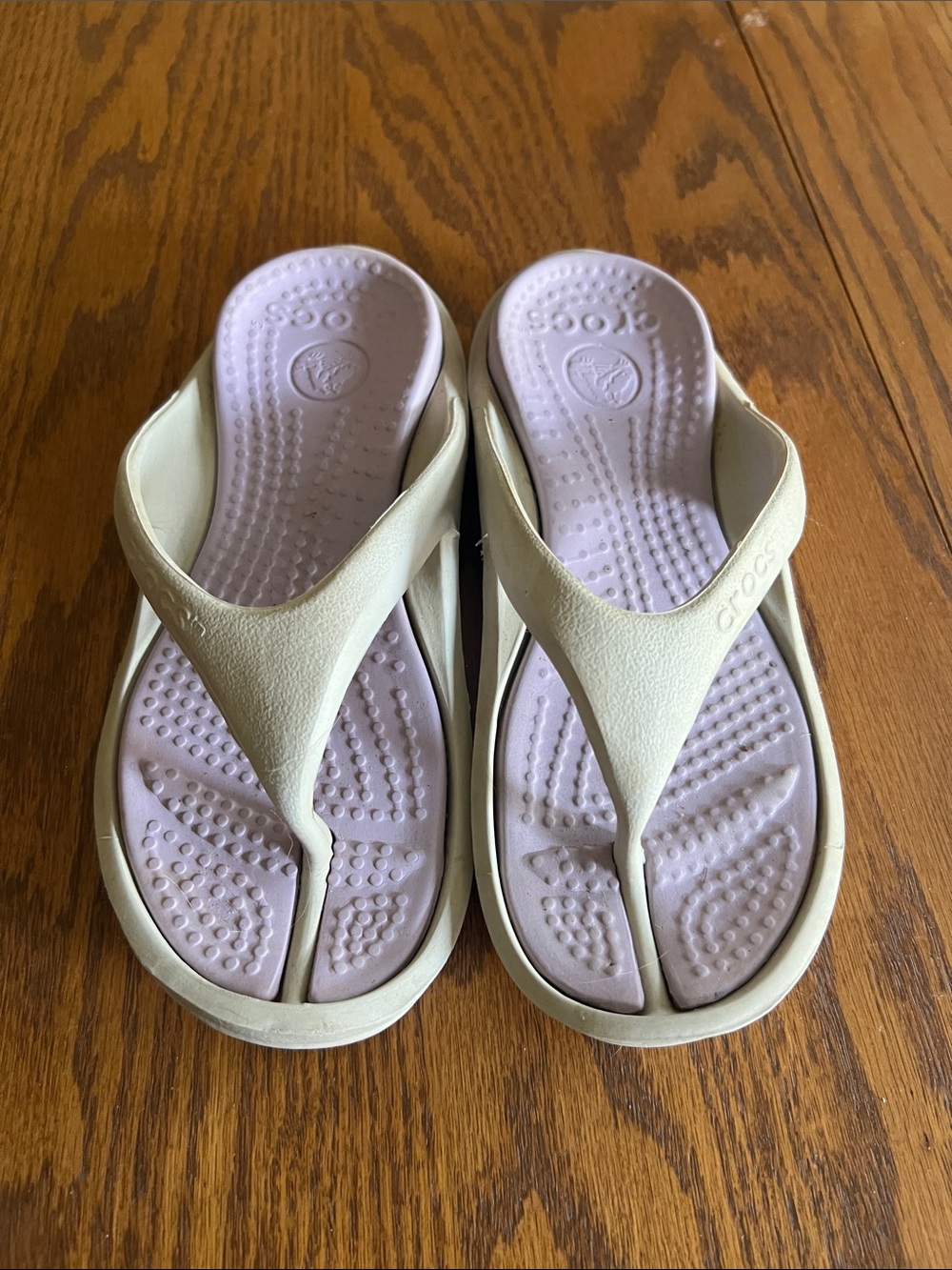 CROCS Adult Flip Flops in Lavender and Beige. Good Used Condition. Sz 7W/ 5M